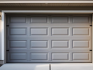 Contemporary residential garage door showcasing the latest smart and energy-efficient technologies in Alpine, California for 2025.